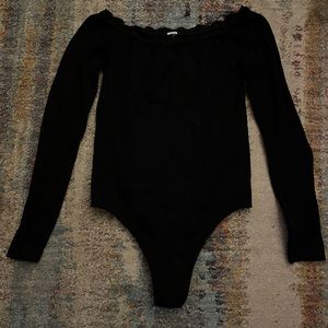Off the shoulder long sleeved body suit